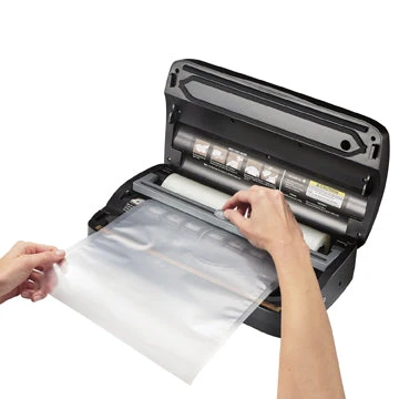 Vacuum Sealer With Roll Cutter And Storage - Image 2